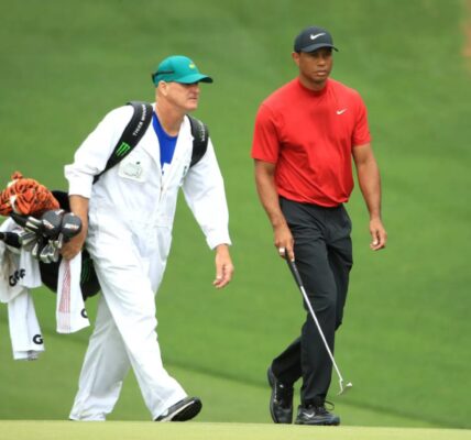 Man spends nearly $100,000 to caddy for Tiger Woods for one day