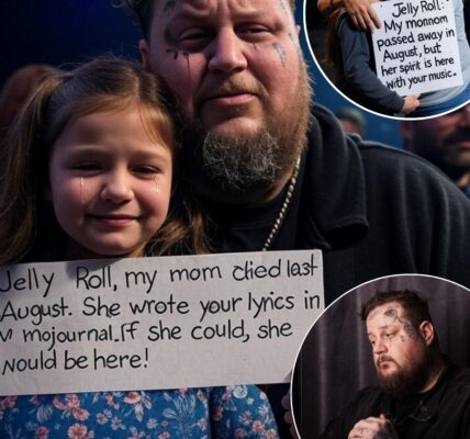 She couldn’t hold the sign steady… but Jelly Roll saw it anyway — Country star halts concert to hug tearful girl whose mom died before they could go together Before the music even started, 9-year-old Ellie Jacobs was already crying. She stood on her seat, clutching a handmade sign in shaky little hands