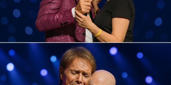 It Was The Final Night Of His Hometown Concert, And Sir Cliff Richard Had Saved One Moment For Last — A Promise Fulfilled. In The Front Row Sat A Young Fan Battling Terminal Cancer, The Same Girl Who Once Said Her Dream Was To Sing With Him Just Once In Her Life. Midway Through The Show, Cliff Paused, Pointed To Her, And Gently Invited Her On Stage. She Trembled As She Took The Microphone, But When Her Voice Broke On The First Note, Cliff Stepped Closer, Placed A Steadying Hand On Her Back, And Began To Sing With His Eyes Closed. The Crowd Fell Silent, Listening To The Two Voices Blend — Fragile And Timeless — Until The Final Chord Faded. Cliff Pulled Her Into A Tight Hug And Whispered, “Thank You For Singing With Me Until The End.” For A Moment, The Stage Wasn’t About Fame Or Farewell — It Was About A Song Shared Between Two Hearts, One That No Illness Could Take Away.
