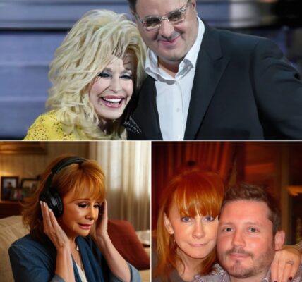 Late on August 8, Vince Gill picked up the phone with a heavy heart and called Dolly Parton. Their dear friend, Reba McEntire, was facing the unthinkable—grieving the loss of her son. Both Vince and Dolly knew they couldn’t take away her pain, but they also knew the one gift they could offer: music. That night, under the quiet Tennessee sky, they sat together on Dolly’s porch, guitars in hand, letting their memories and emotions guide them. Hour by hour, a song began to take shape—a gentle ballad about faith, strength, and love that never lets go. By sunrise, they had recorded a simple, raw version right there on the porch, the crickets and summer breeze almost woven into the melody. They titled it “You’re Not Walking Alone” and sent it straight to Reba, not as a performance, but as a lifeline. It was more than just a song—it was a reminder that even in the darkest nights, friendship can carry you, and music can help mend what words alone cannot.